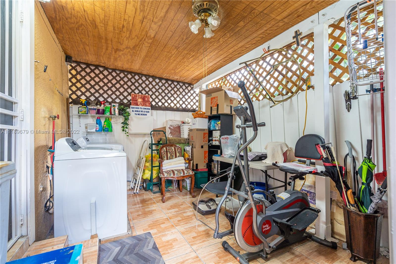 627 West 68th Street, Unit 627 Hialeah, FL 33014 - Photo 31 of 31 a storage room with furniture water and windows