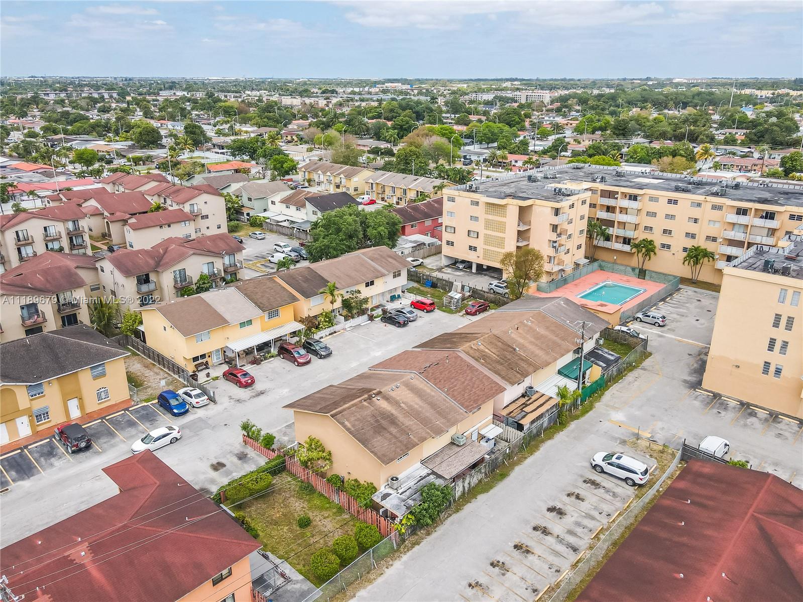 627 West 68th Street, Unit 627 Hialeah, FL 33014 - Photo 4 of 31 an aerial view of a city