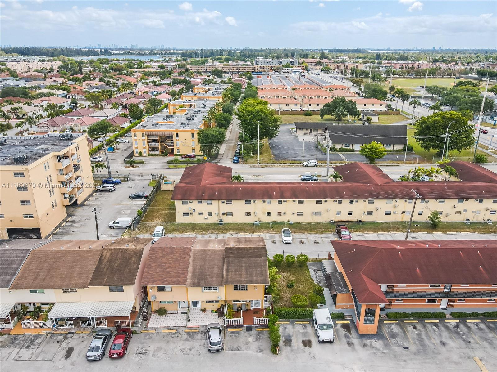 627 West 68th Street, Unit 627 Hialeah, FL 33014 - Photo 8 of 31 an aerial view of a building with outdoor space