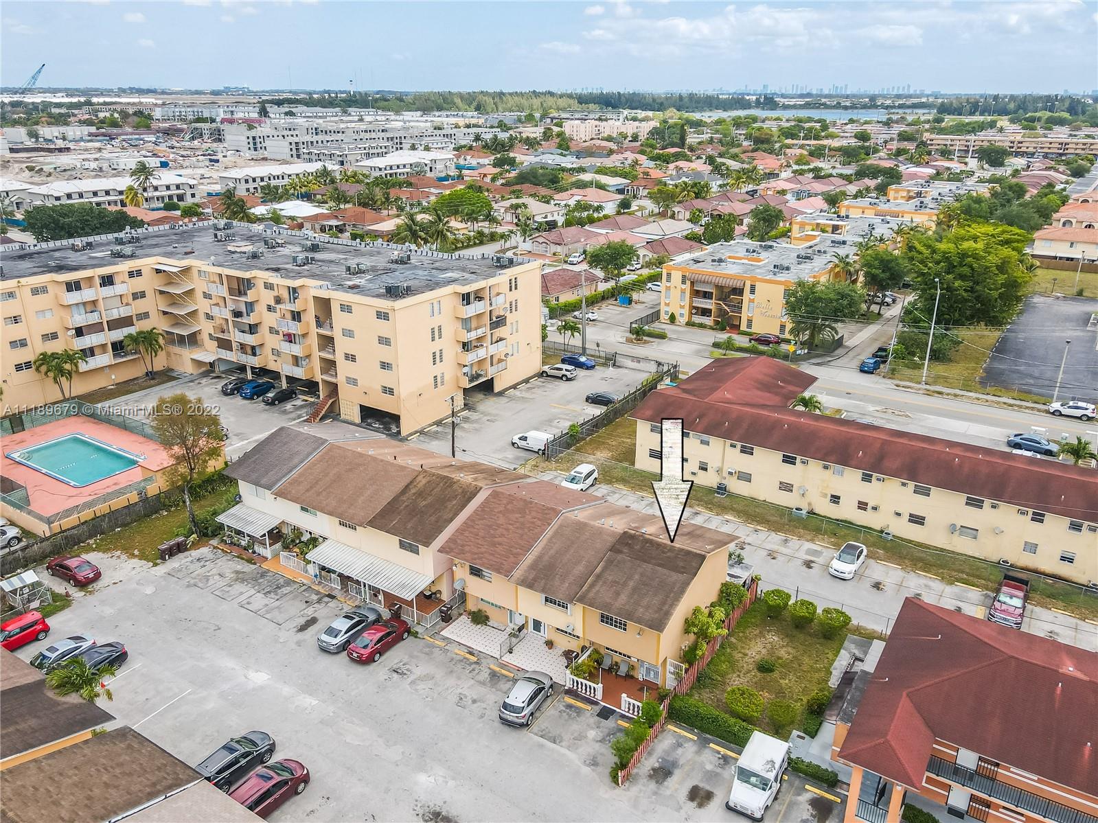 627 West 68th Street, Unit 627 Hialeah, FL 33014 - Photo 9 of 31 an aerial view of a city
