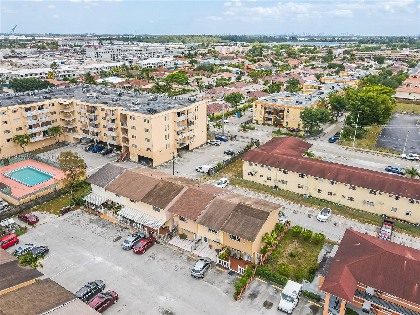 627 West 68th Street, Unit 627 Hialeah, FL 33014 - Photo 10 of 31 an aerial view of a city