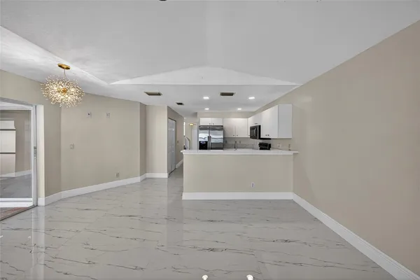 a view of a kitchen and a sink