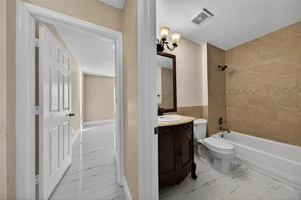 an empty room with a bathroom