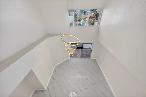 a view of a hallway with workspace