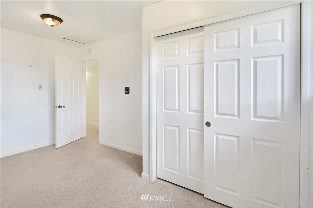 171 East Pole Road Lynden, WA 98264 - Photo 25 of 39 a view of an empty room with wooden floor