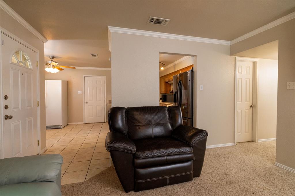 401 Berryhill Drive Springtown, TX 76082 - Photo 7 of 26 a living room with furniture