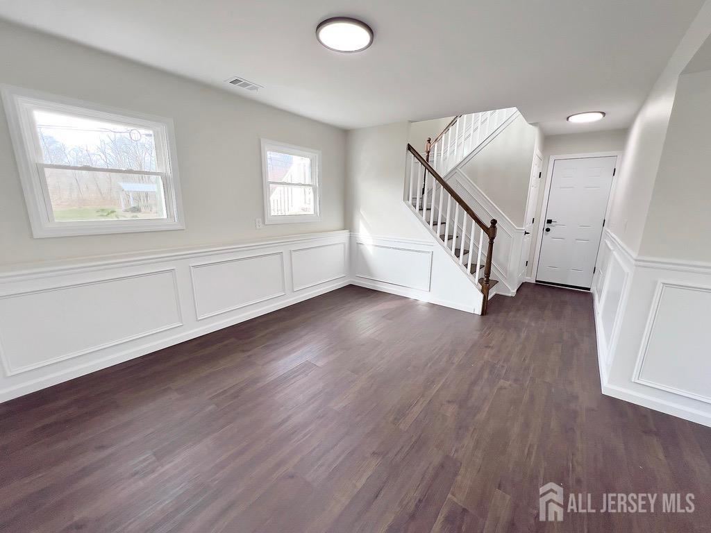 1273 Brookside Road Piscataway, NJ 08854 - Photo 24 of 33 wooden floor in an empty room with a window