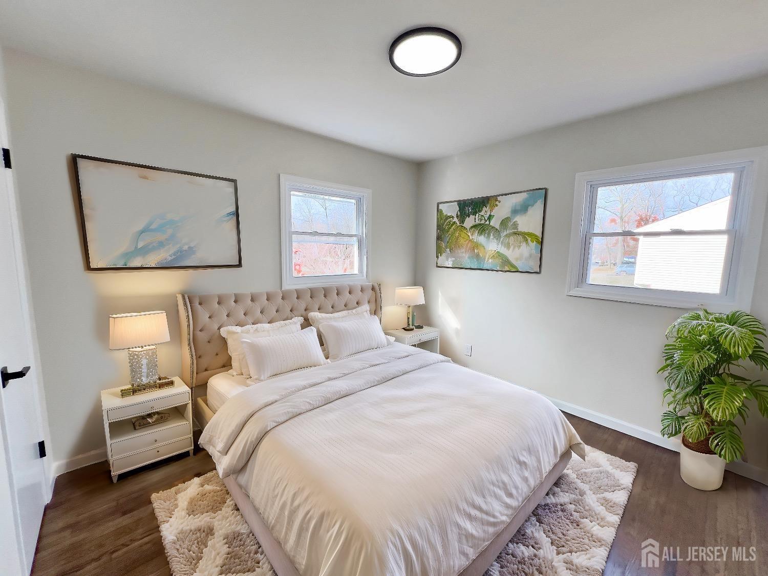 1273 Brookside Road Piscataway, NJ 08854 - Photo 6 of 33 a bedroom with a bed and a painting on the wall