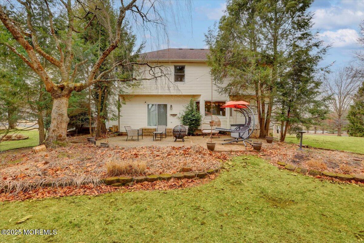 210 Hunt Road Freehold, NJ 07728 - Photo 16 of 39 a view of open space with a big yard and large trees