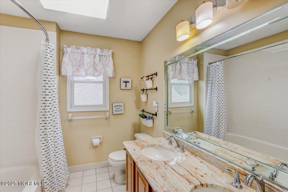 210 Hunt Road Freehold, NJ 07728 - Photo 37 of 39 a bathroom with a granite countertop sink toilet and shower