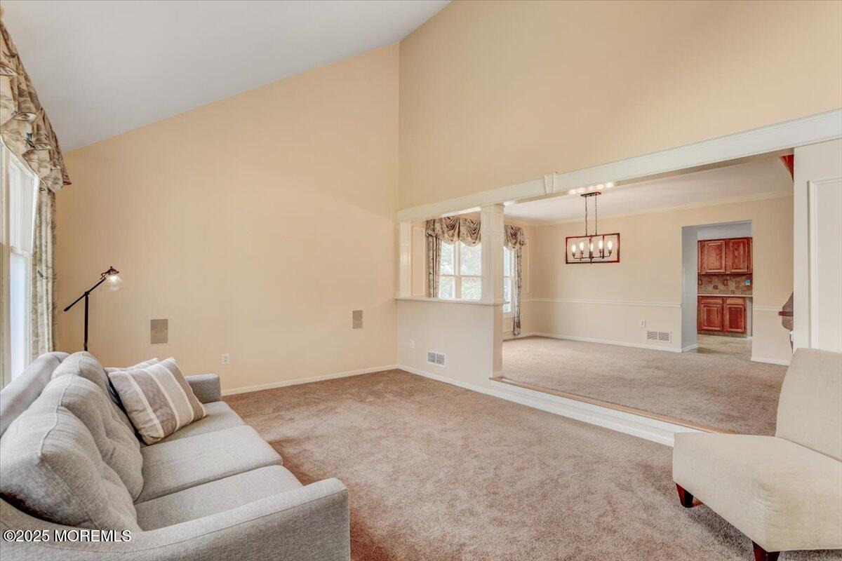 210 Hunt Road Freehold, NJ 07728 - Photo 7 of 39 a living room with furniture and window