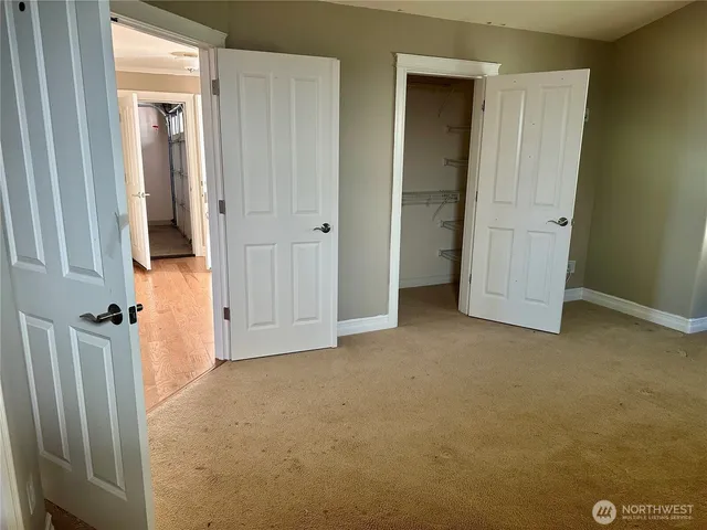 an empty room with closet