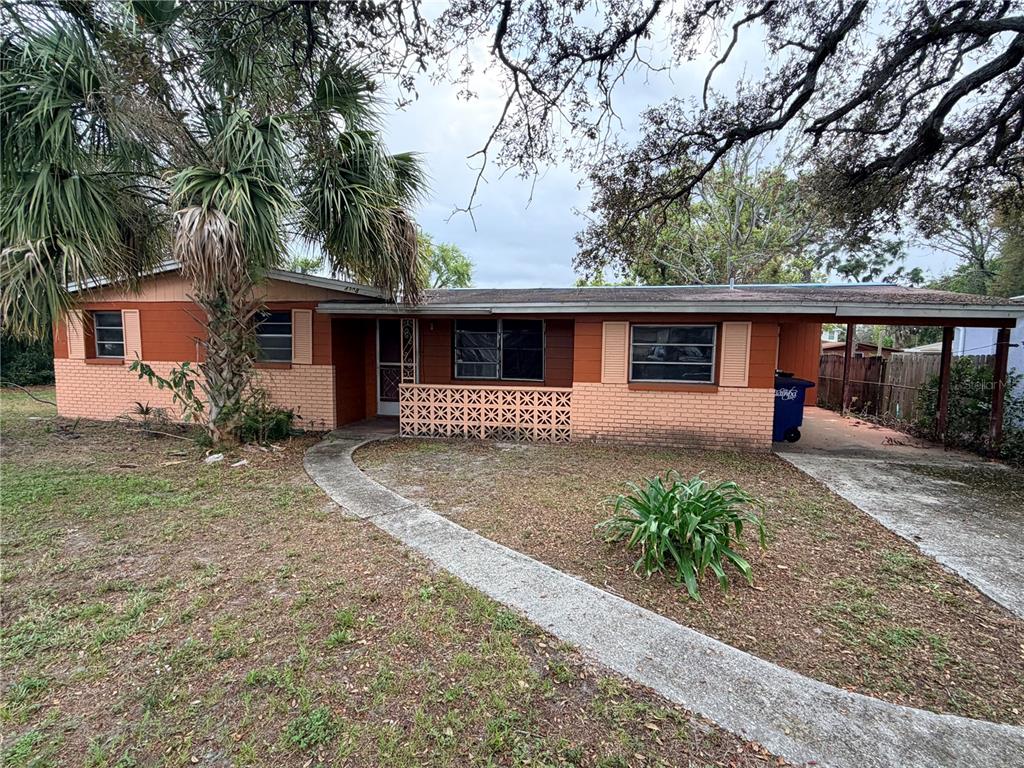 4308 West Laurel Street Tampa, FL 33607 - Photo 1 of 1 front view of a house with a patio