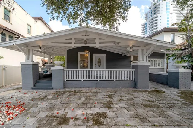 a view of a house with a roof deck
