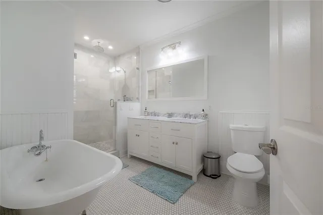 a bathroom with a white bathtub