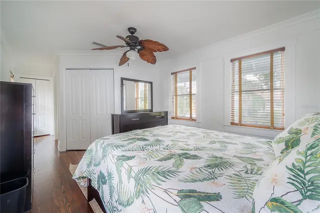 a bathroom with a sink toilet and window