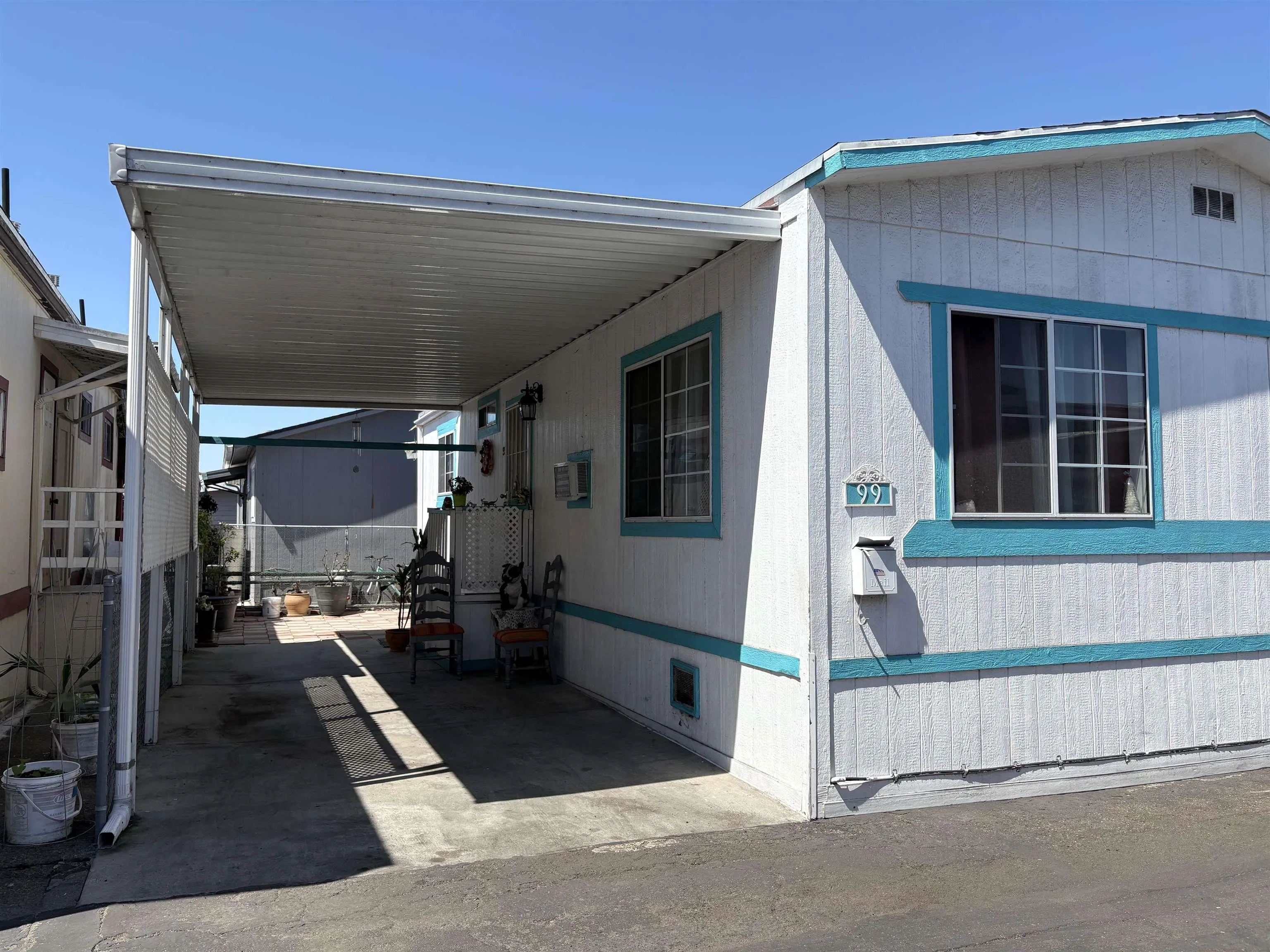 402 63rd Street, Unit 99 San Diego, CA 92114 - Photo 2 of 15 a view of a house with a street