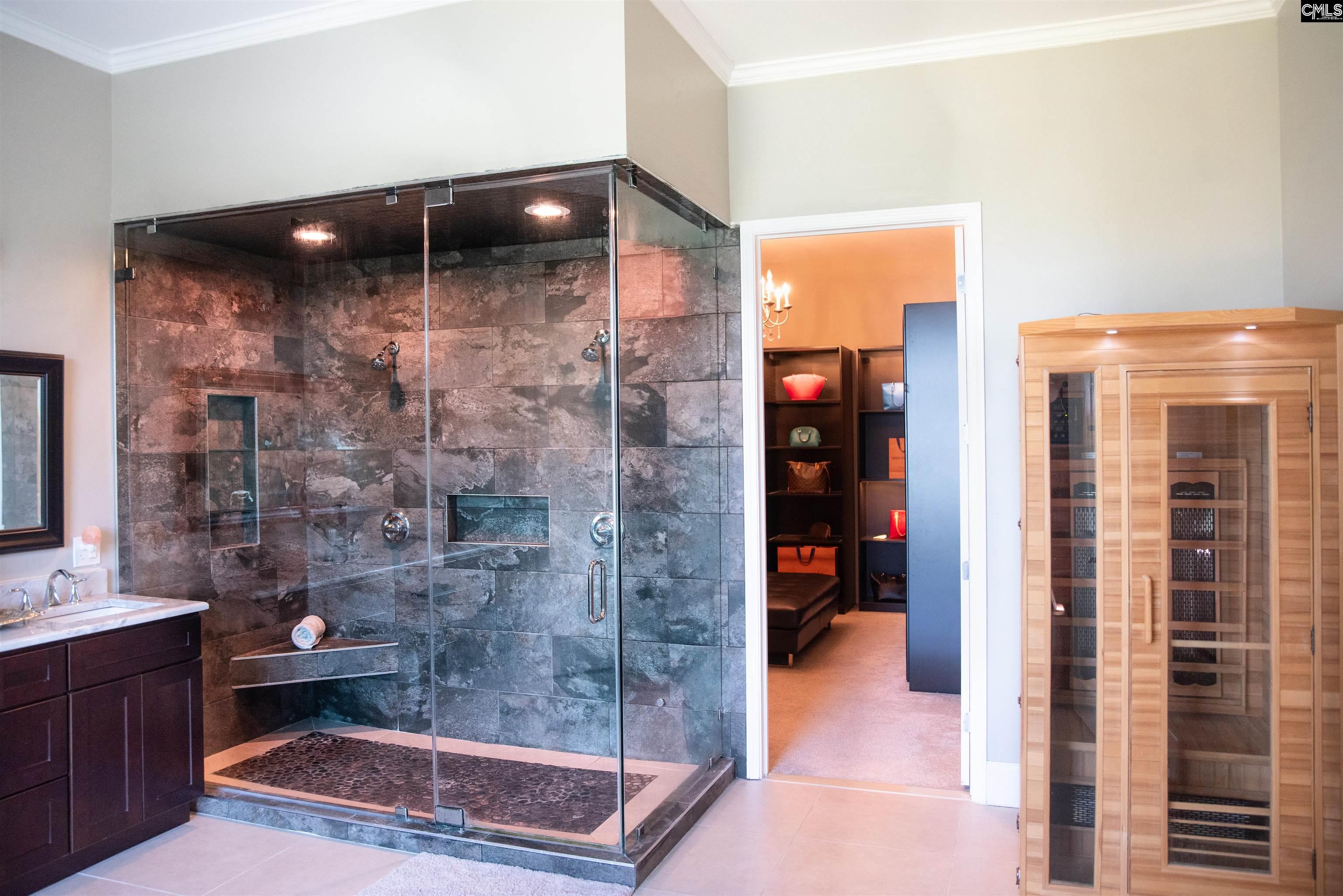 305 Northlake Road Columbia, SC 29223 - Photo 8 of 46 a bathroom with a glass shower door and a sink