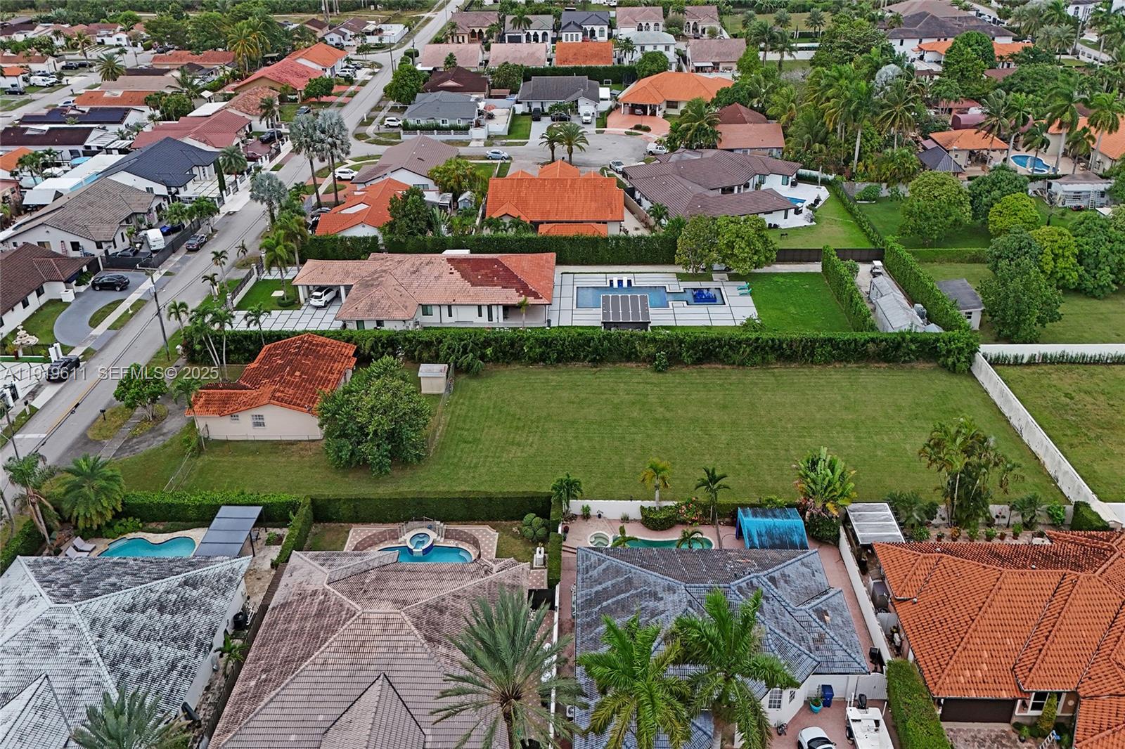13401 Southwest 38th Street Miami, FL 33175 - Photo 25 of 45 an aerial view of residential houses with outdoor space and lake view