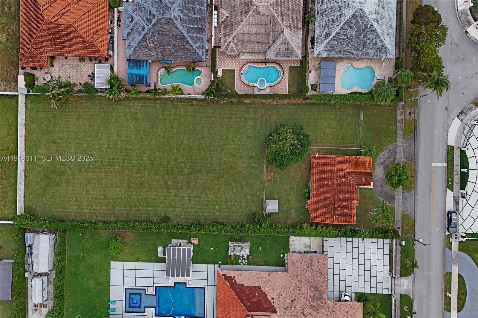 13401 Southwest 38th Street Miami, FL 33175 - Photo 34 of 45 an aerial view of a house with outdoor space and lake view