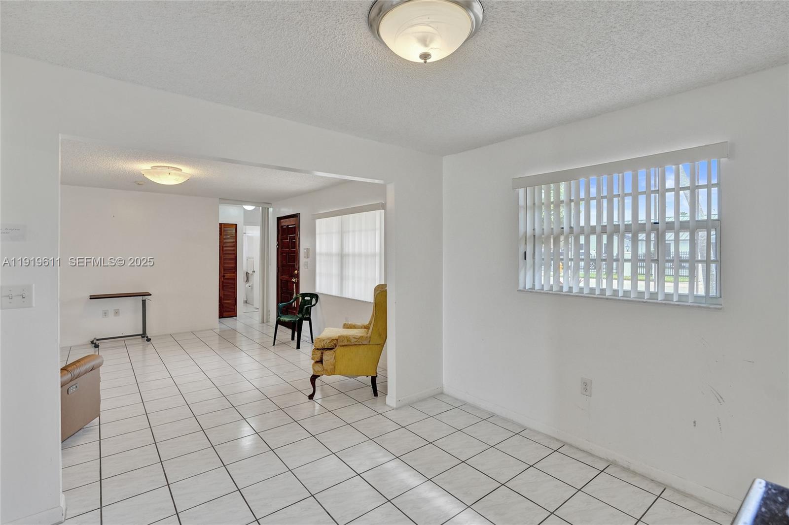 13401 Southwest 38th Street Miami, FL 33175 - Photo 38 of 45 a view of a livingroom with wooden floor and furniture