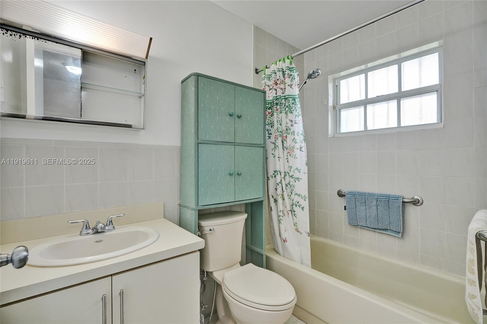 13401 Southwest 38th Street Miami, FL 33175 - Photo 45 of 45 a bathroom with a sink toilet and shower