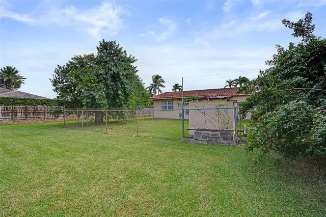 a view of a golf course with a garden