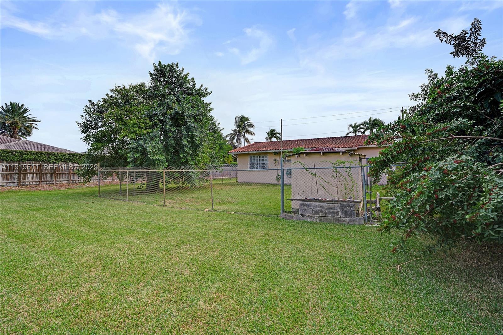13401 Southwest 38th Street Miami, FL 33175 - Photo 5 of 45 a view of a tiny house with a yard