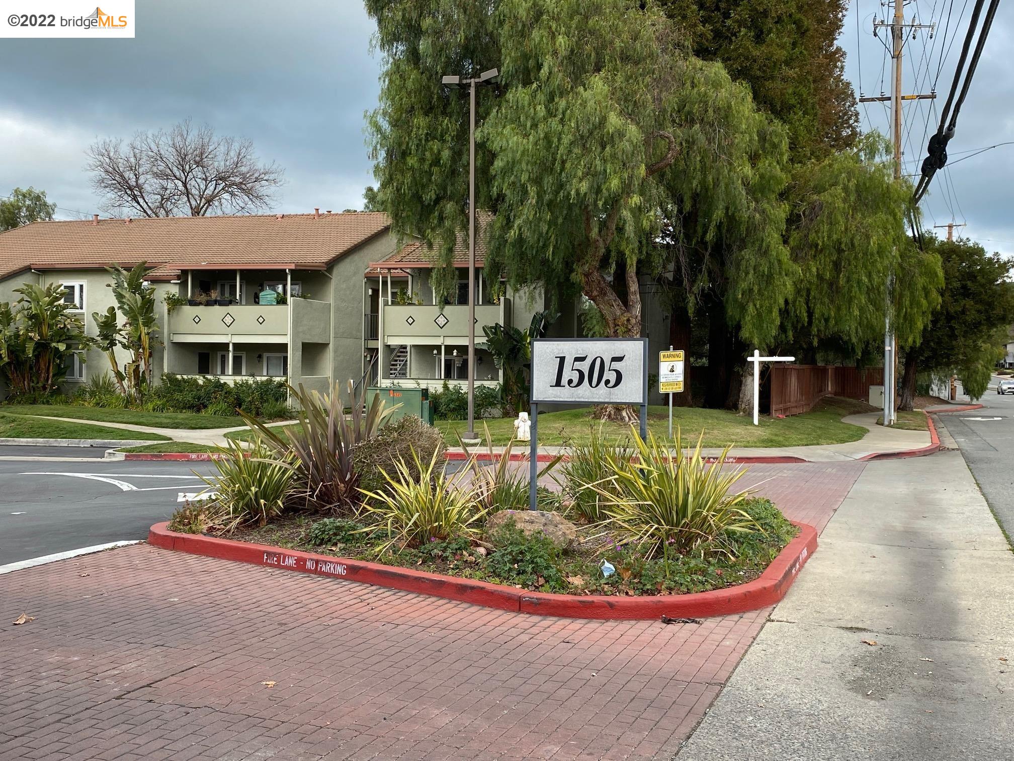 a view of a house with a garden
