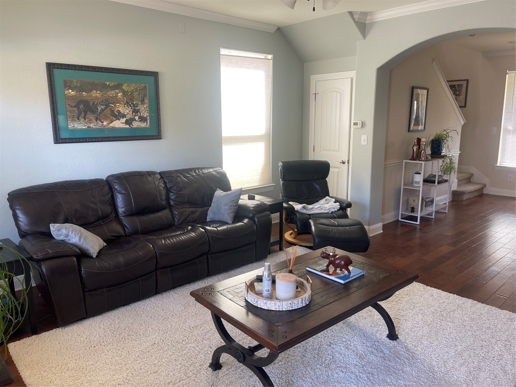 6708 Menchaca Road, Unit 11 Austin, TX 78745 - Photo 2 of 8 a living room with furniture a rug and a window