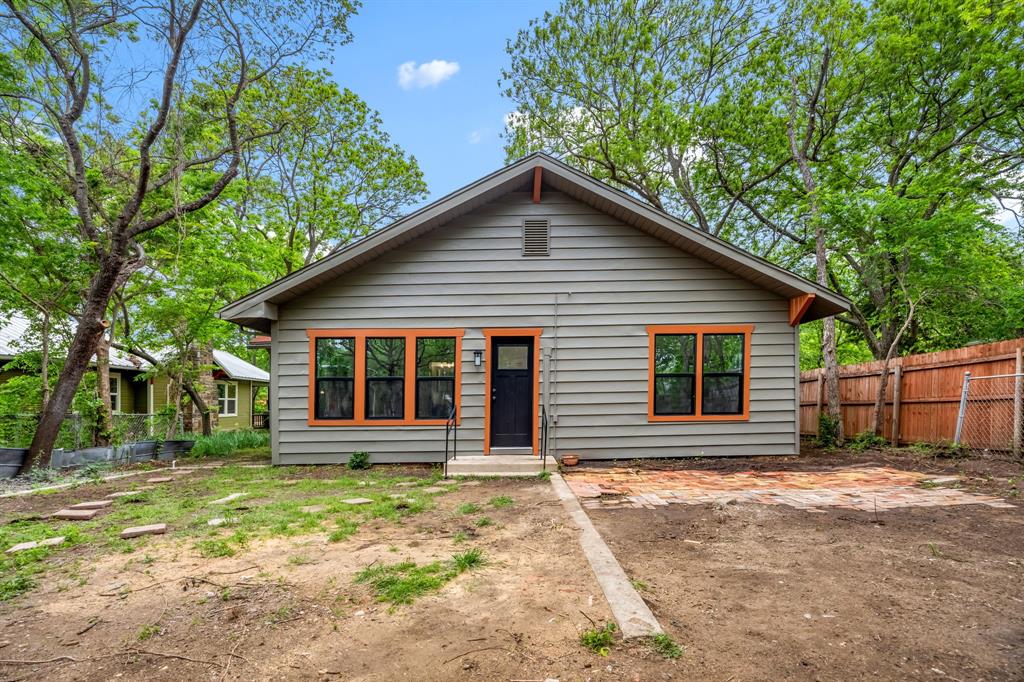 1014 Bolivar Street Denton, TX 76201 - Photo 36 of 36 a front view of a house with garden