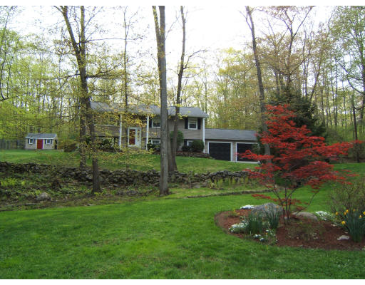 86 Purgatory Road Sutton, MA 01590 - Photo 1 of 16 a view of a house with backyard