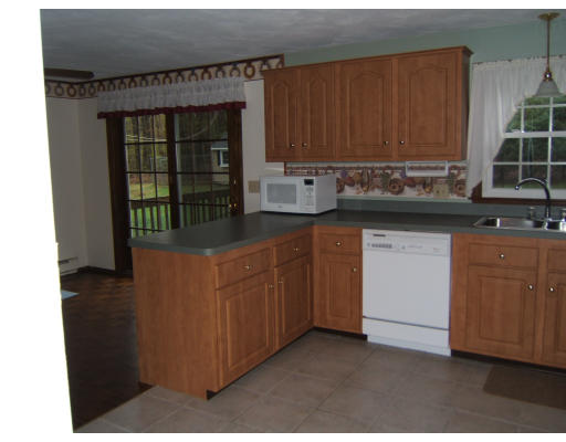 86 Purgatory Road Sutton, MA 01590 - Photo 11 of 16 a kitchen with granite countertop cabinets and window