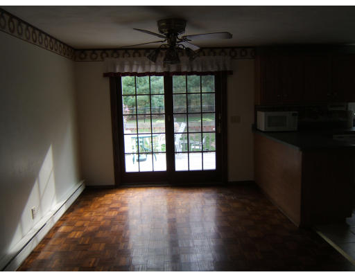 86 Purgatory Road Sutton, MA 01590 - Photo 12 of 16 a view of an empty room with a window