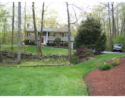 86 Purgatory Road Sutton, MA 01590 - Photo 2 of 16 a view of a big yard in front of a house