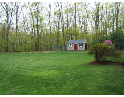 86 Purgatory Road Sutton, MA 01590 - Photo 5 of 16 a view of a house with a yard