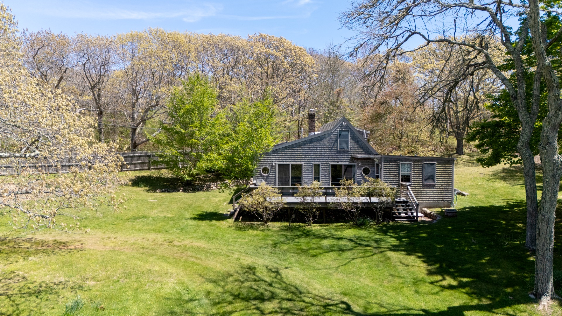 10 Abel's Neck Road Chilmark, MA 02535 - Photo 17 of 20 a front view of a house with garden