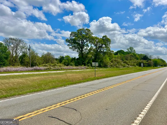 a view of a golf course with a lake