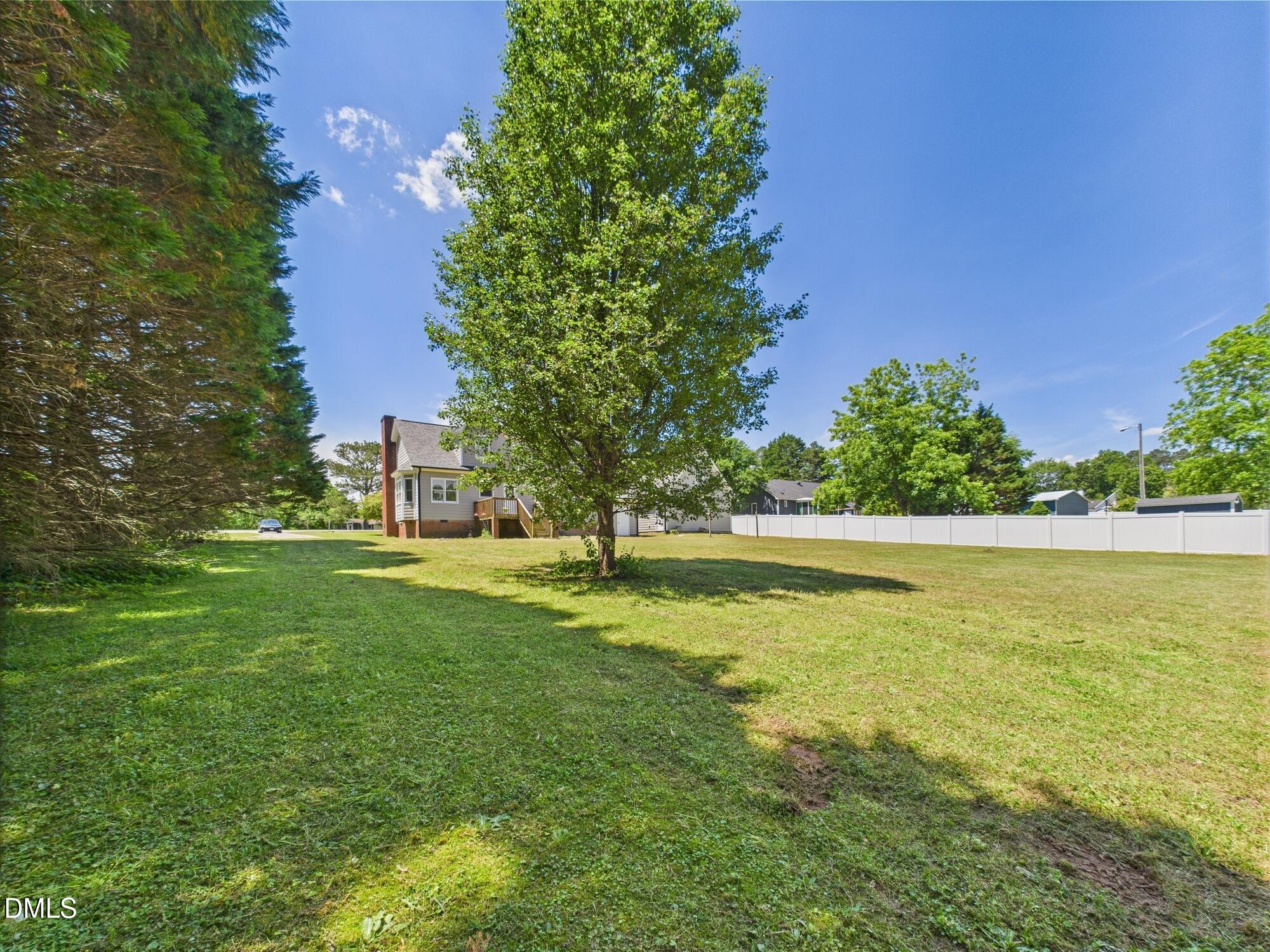 10917 Fanny Brown Road Raleigh, NC 27603 - Photo 46 of 54 a view of an outdoor space and a yard