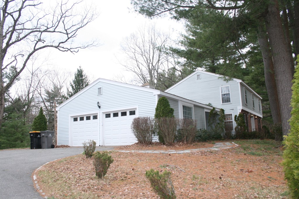 1 Whiting Road Framingham, MA 01701 - Photo 2 of 28 a view of a white house with a large tree