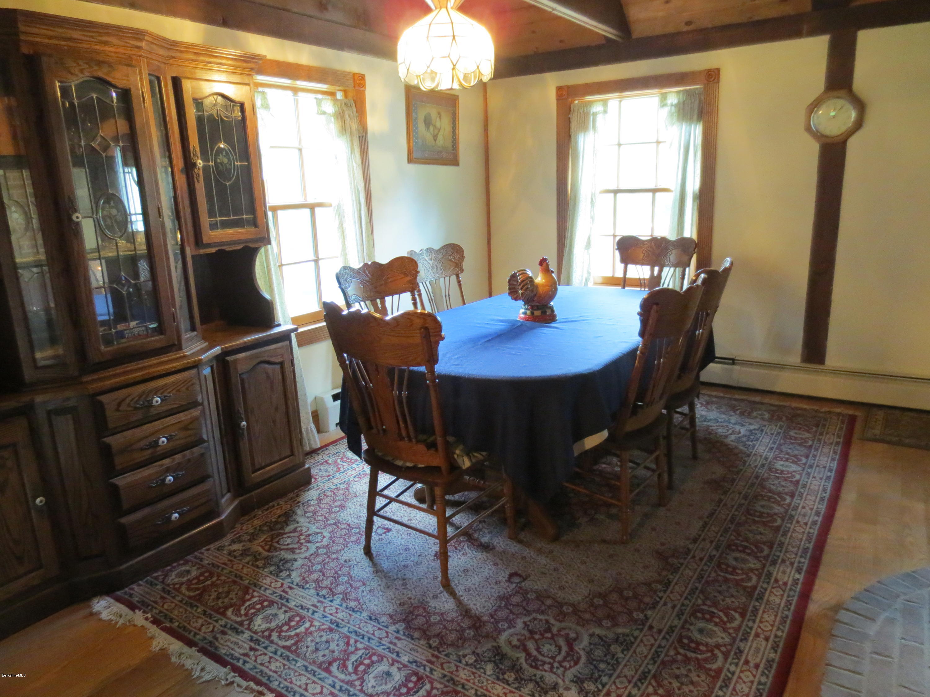 87 Crane Road Chester, MA 01011 - Photo 5 of 16 a view of a dining room with furniture and window