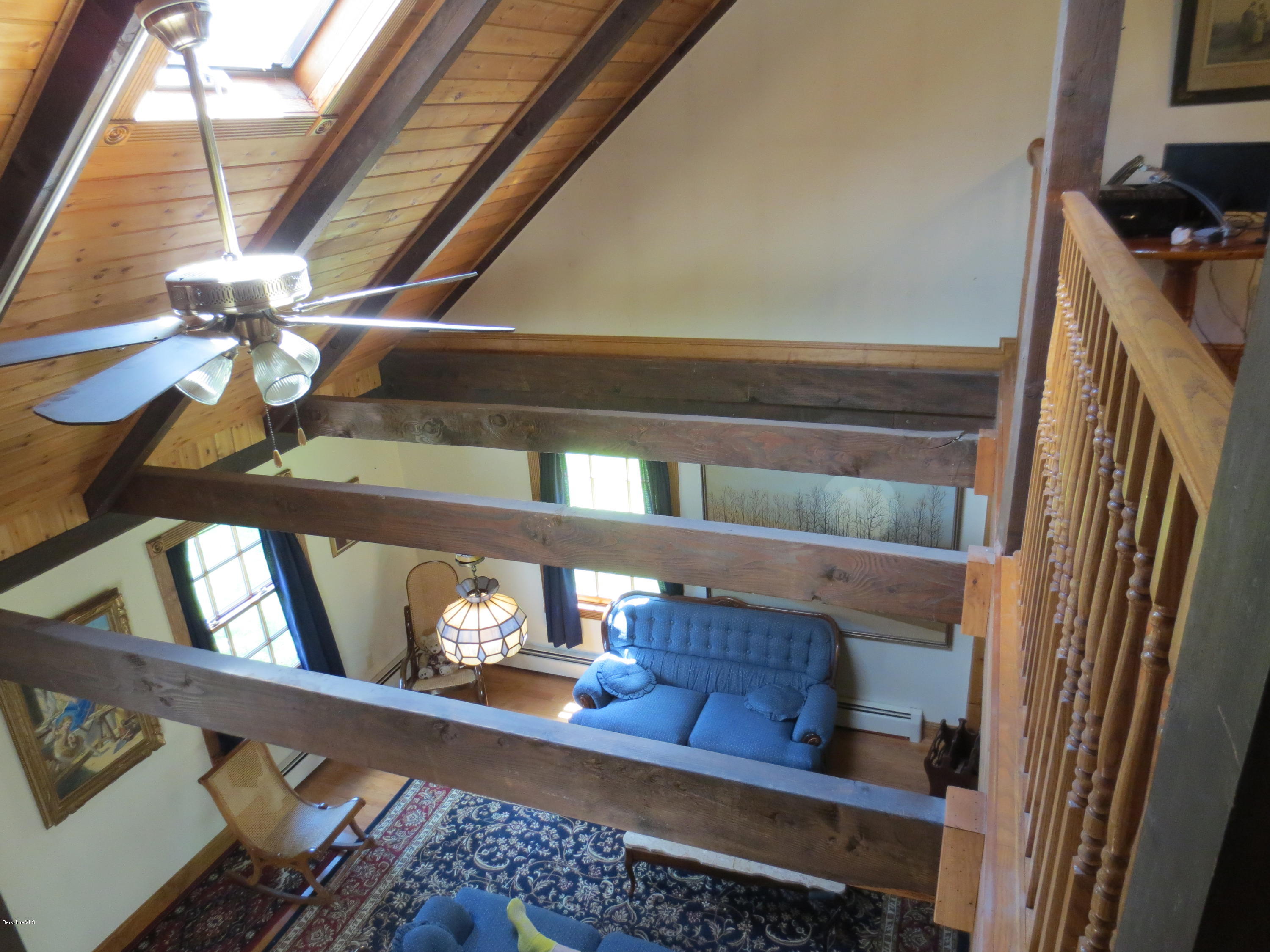 87 Crane Road Chester, MA 01011 - Photo 8 of 16 a view of staircase with wooden floor