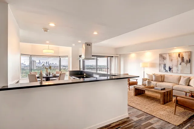 a large living room with a large window