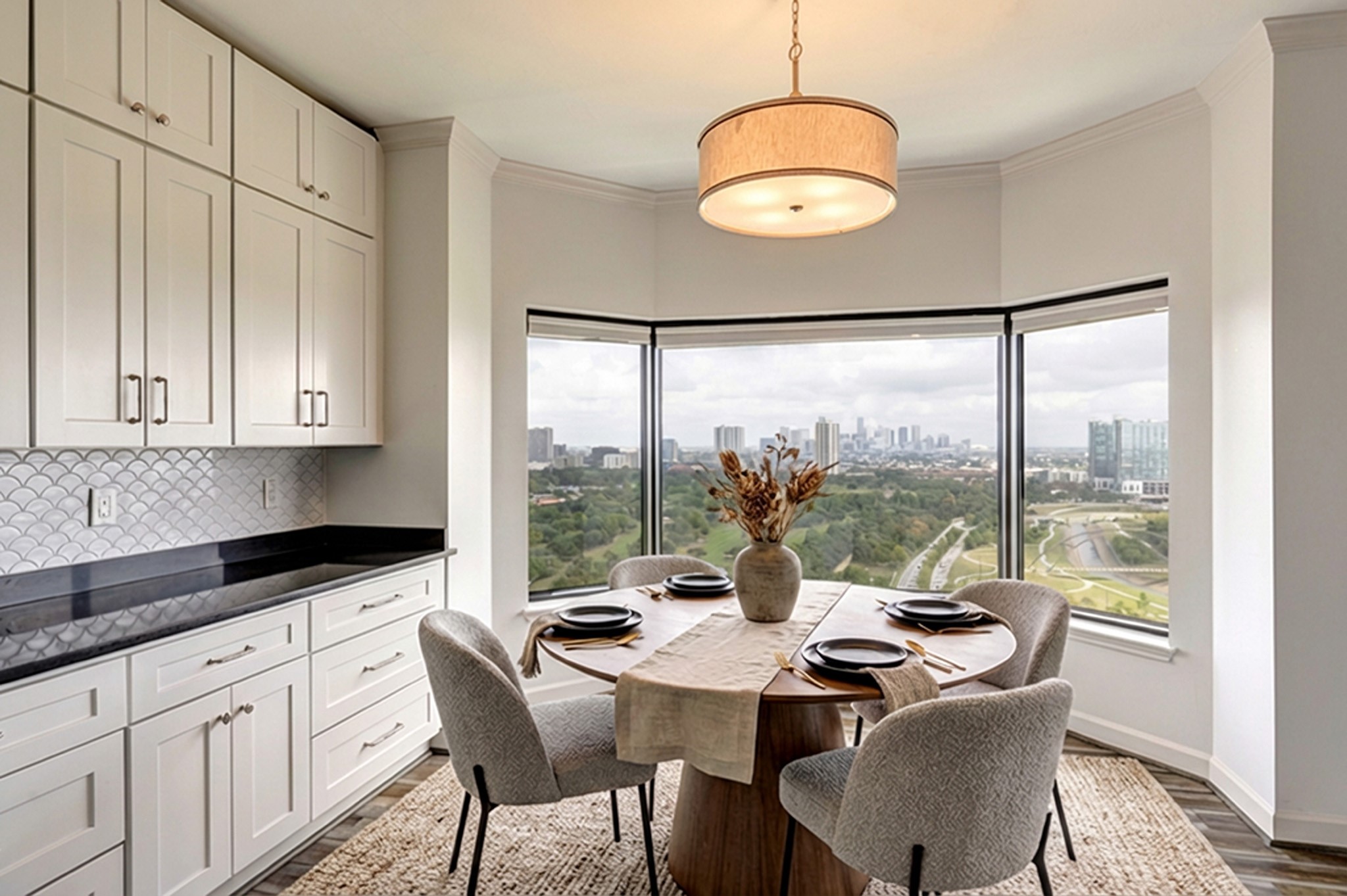 2001 Holcombe Boulevard, Unit 2304 Houston, TX 77030 - Photo 4 of 19 a kitchen with stainless steel appliances granite countertop a stove a sink and white cabinets with wooden floors