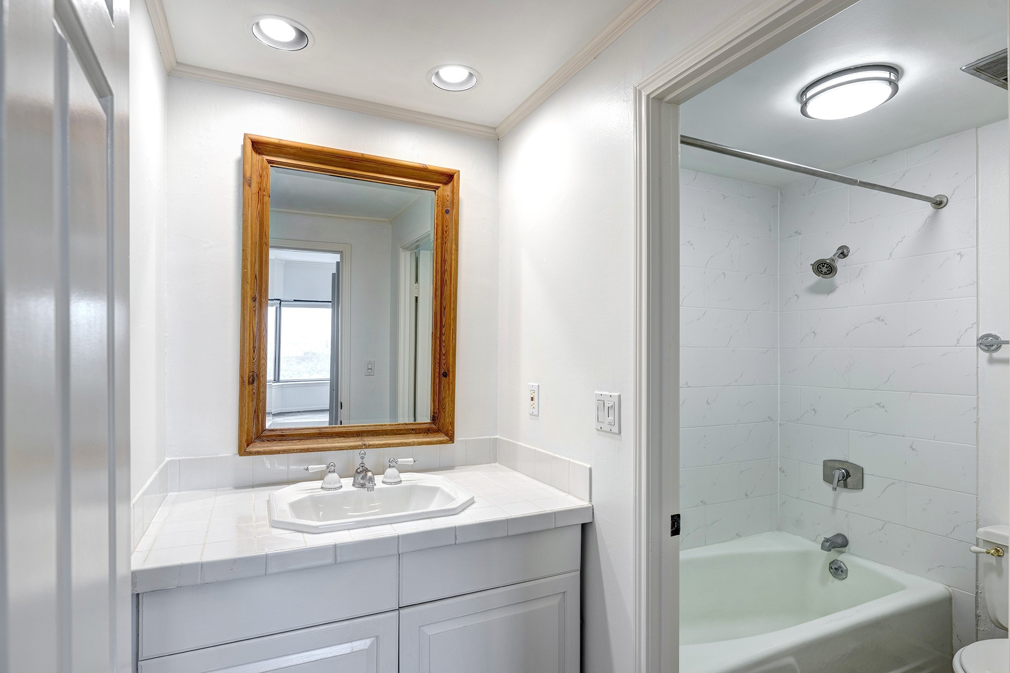 2001 Holcombe Boulevard, Unit 2304 Houston, TX 77030 - Photo 7 of 19 a bathroom with a sink and a bathtub