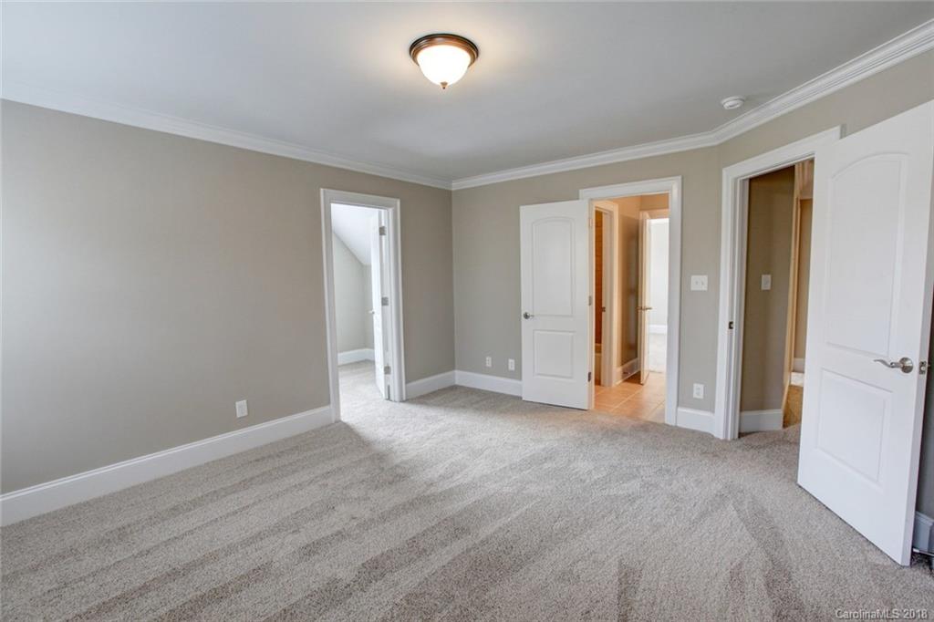 272 Hemmingway Lane Fort Mill, SC 29708 - Photo 13 of 24 a view of empty room with wooden floor and fan