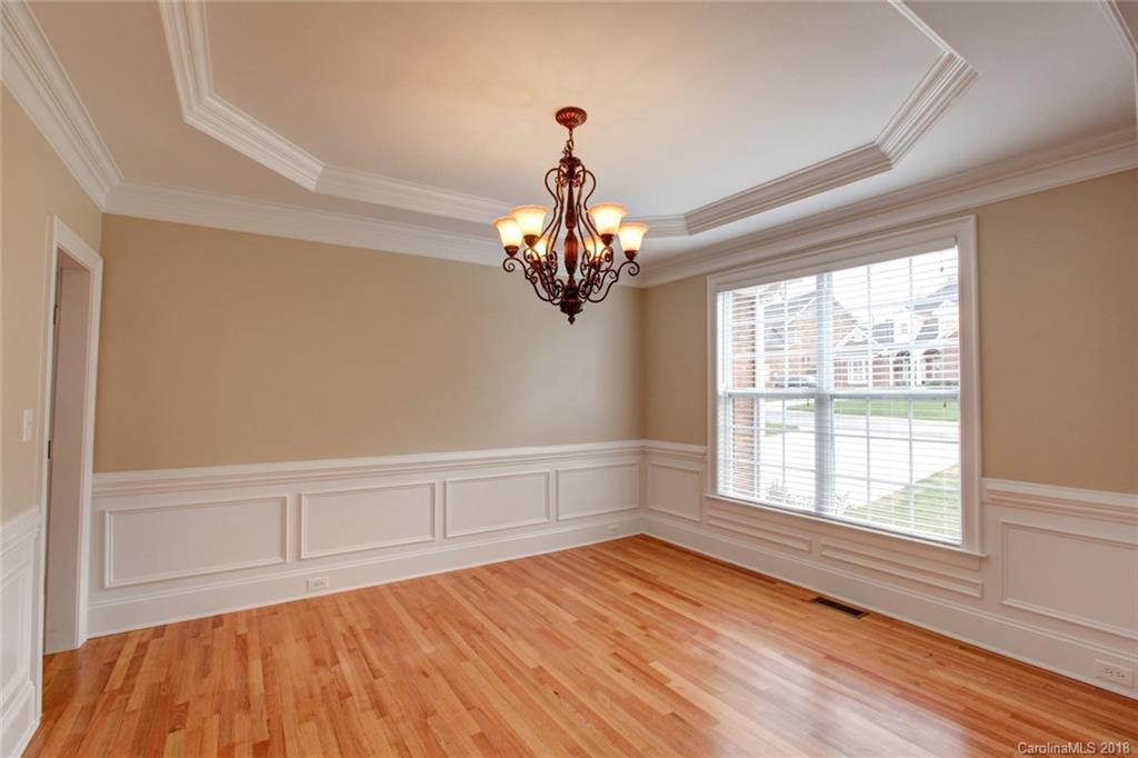 272 Hemmingway Lane Fort Mill, SC 29708 - Photo 8 of 24 wooden floor in an empty room with a window