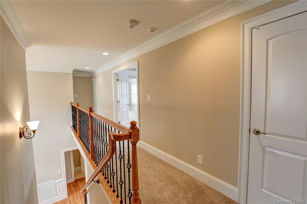 272 Hemmingway Lane Fort Mill, SC 29708 - Photo 9 of 24 a view of a hallway with staircase