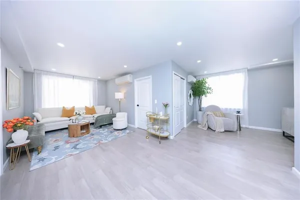 a living room with furniture and a couch