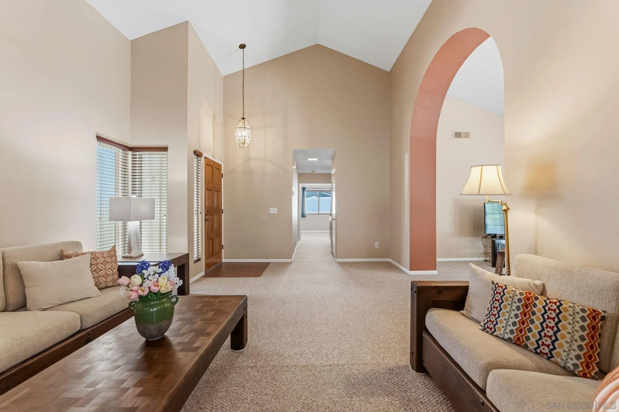 10565 Strathmore Drive Santee, CA 92071 - Photo 6 of 59 a living room with furniture and wooden floor